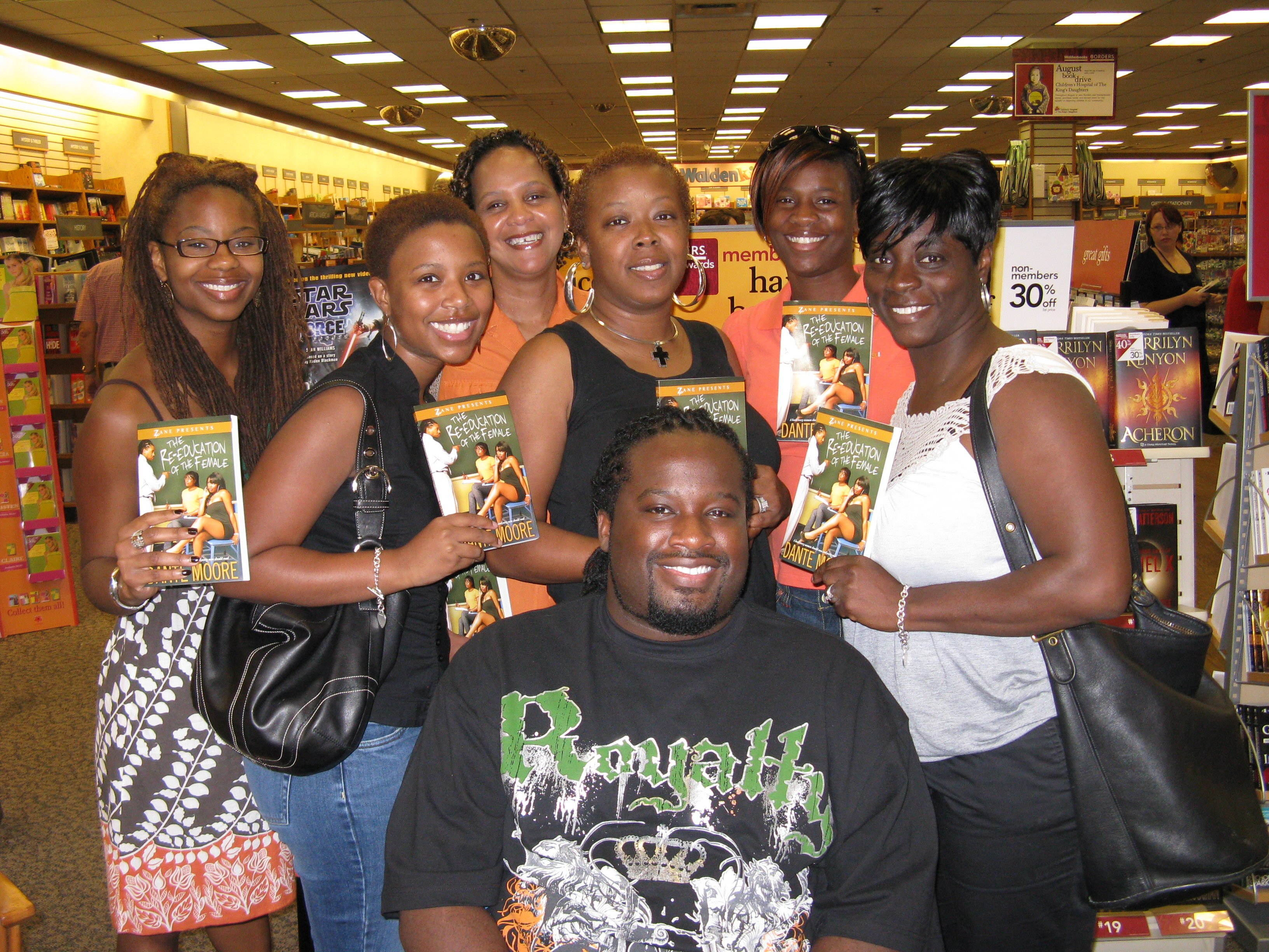 Dante Moore with the Ladies of Essence book club