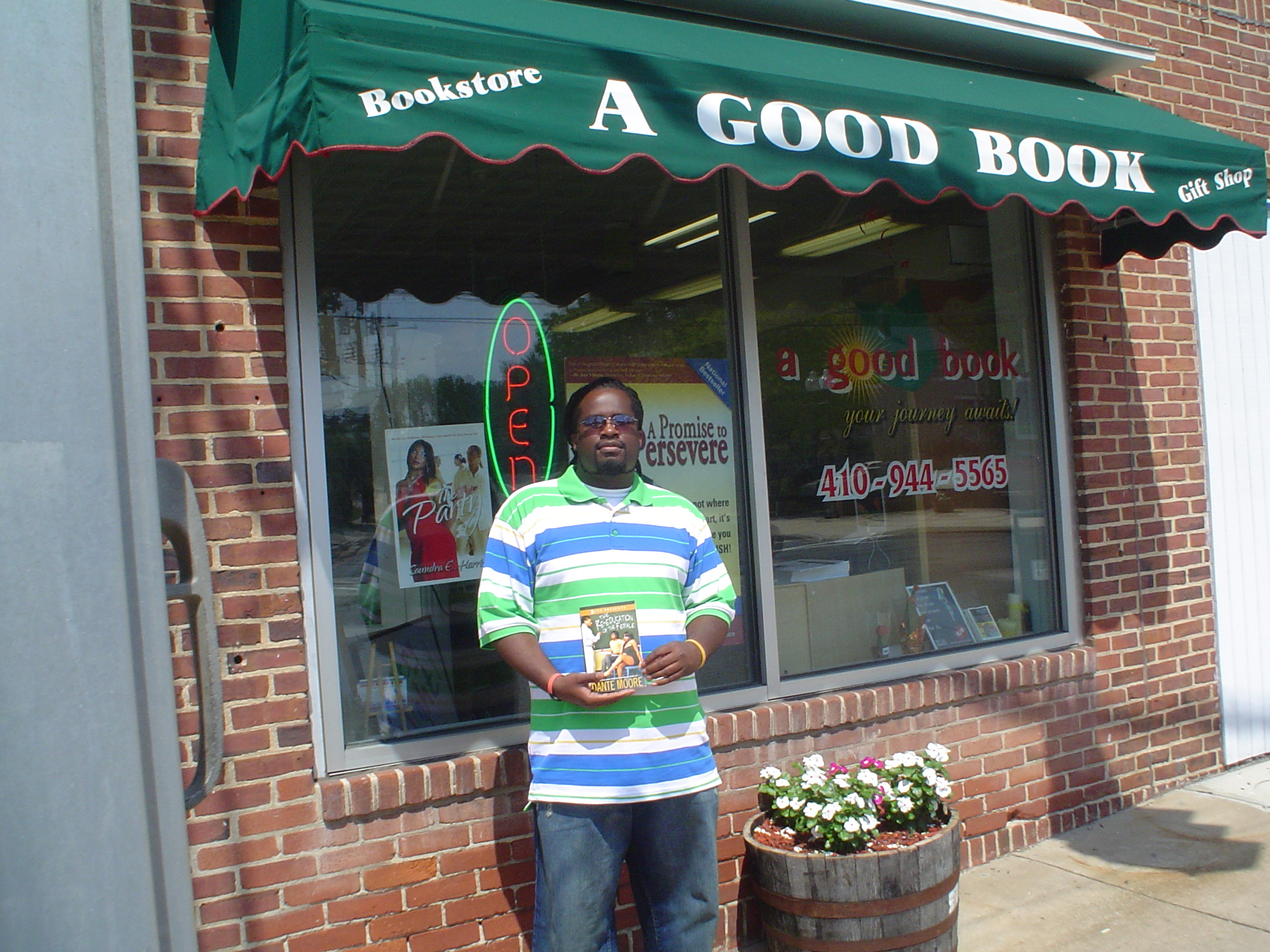 Author outside A Good Book store